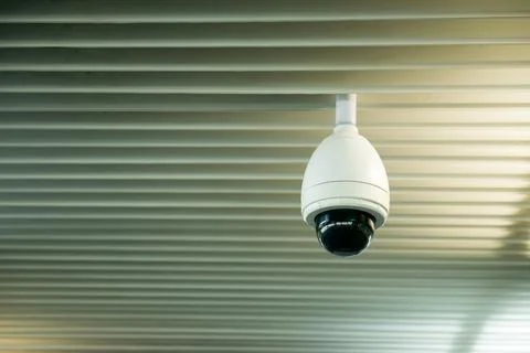 Cctv camera hang on the ceiling Stock Photos