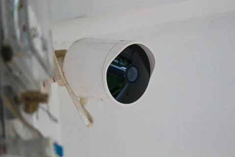 CCTV camera in a house. White. Stock Photos