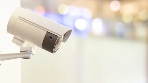 CCTV camera installed on wall of the building. Scan the area for surveillance  Video stock 227728957