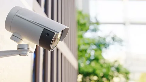 CCTV camera installed on wall of the building. Scan the area for surveillance  Vídeo Stock 227729087