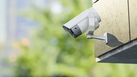 CCTV camera installed on wall of the building. Scan the area for surveillance  Video stock 227729089