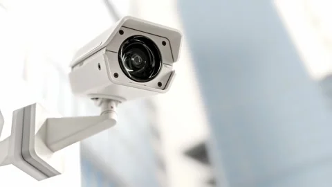 CCTV camera installed on wall of the building. Video stock 302876247