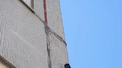 CCTV camera located on the wall of the school building Stockbeeldmateriaal 75446099