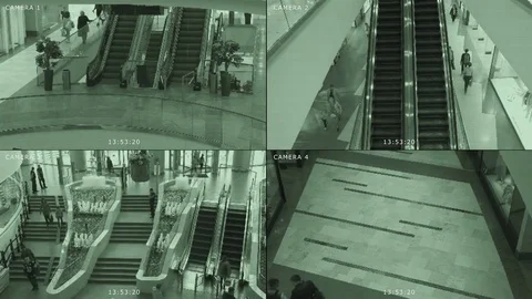 CCTV camera monitor in the mall. The screen is divided into 4 parts. System of Stock Footage