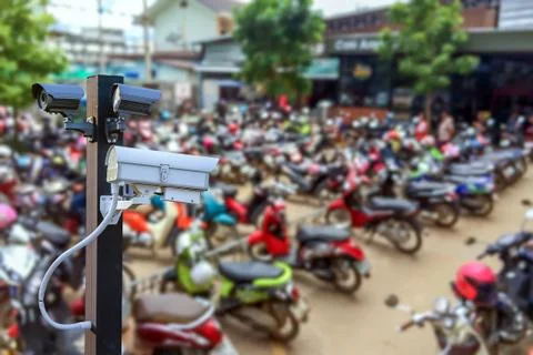 CCTV camera operating in car or motorcycle parking ,Concept Security in condo Foto stock