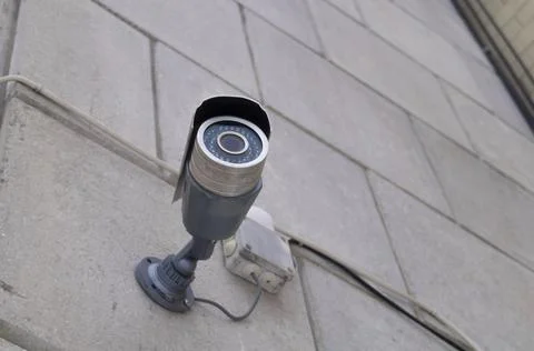 CCTV camera outside the building. Security video system for monitoring the Stock Photos