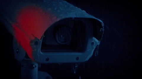 CCTV Camera In Rain With Alarm Lights Flashing Stock Footage 329244553