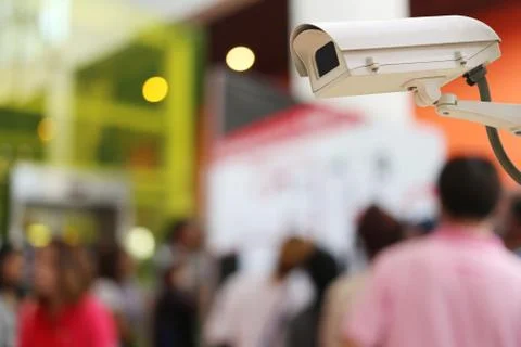 CCTV Camera Record on blur background of people in the Shopping mall. Stock Photos