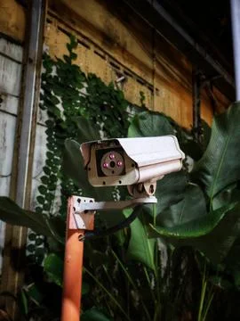 CCTV camera. Security camera on the wall Stock Photos