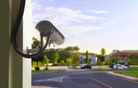 CCTV camera security at outdoor parking lot. With copy space for text or desi Stock Photos