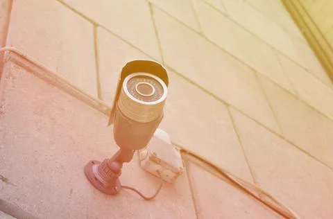 CCTV camera security system of the building. Watching what's happening outside Stock Photos