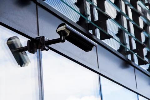 Cctv camera security system on office building Stock Photos