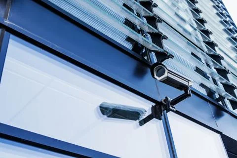 Cctv camera security system on office building Stock Photos