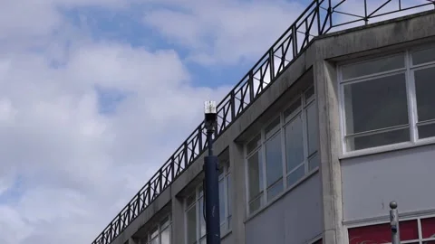 CCTV camera spinning around in street Stock Footage 180199441