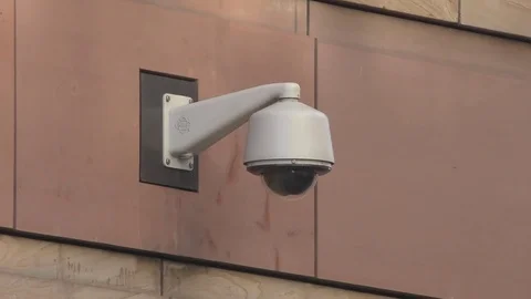 CCTV camera on the wall of the building. Video stock 82912583
