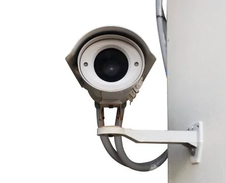 CCTV camera on wall isolated on white background. Stock Photos