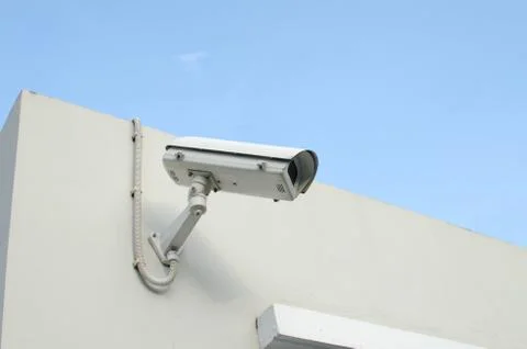 CCTV camera on a wall watch rigth Stock Photos