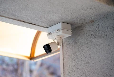 CCTV camera on white background with home security system concept Stock Photos