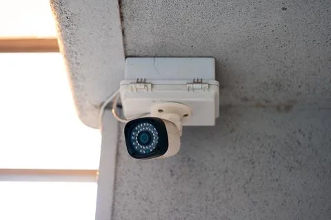CCTV camera on white background with home security system concept Stock Photos