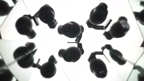 CCTV camera on a white background in kaleidoscopic reflection. Global Stock Footage 87826752