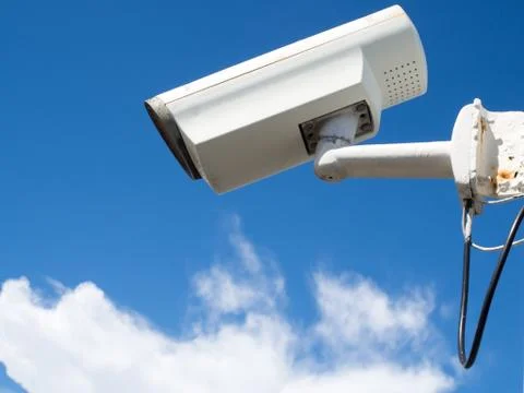 CCTV cameras on sky background. Photos