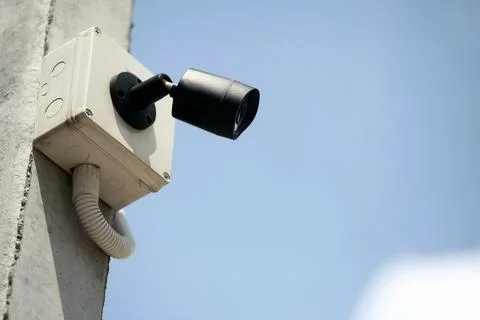 CCTV , closed circuit camera with Blue Sky Background Stock Photos