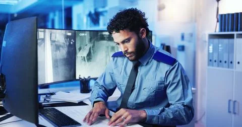 CCTV, computer screen and security with man in office at night for monitoring Stock Photos