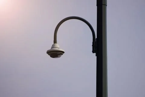 CCTV dome camera on the street, security in the city. Covert shooting of what Stock Photos