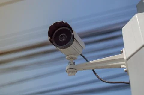 CCTV installed on the roadside, behind the wire can be seen for safety check. Stock Photos