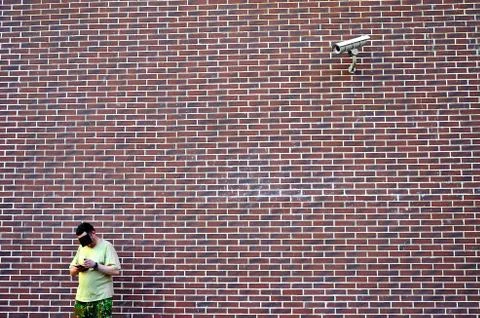 CCTV IR camera mounted on the brick wall, security camera in office building Stock-Fotos