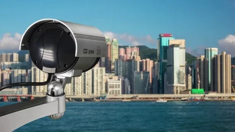 CCTV security on the building. Below is a aerial view of Hong Kong city. Stock Footage 83065702