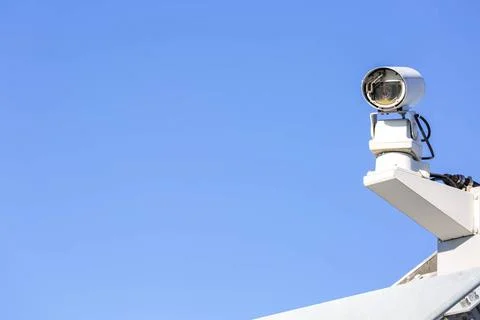 CCTV security camera CCTV security camera over blue sky Copyright: xZoonar... Stock Photos