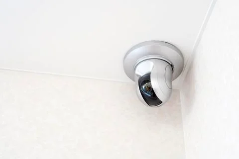 CCTV security camera on ceiling Stock Photos