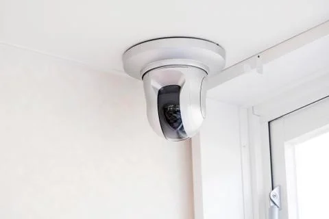 CCTV security camera on ceiling Stock Photos