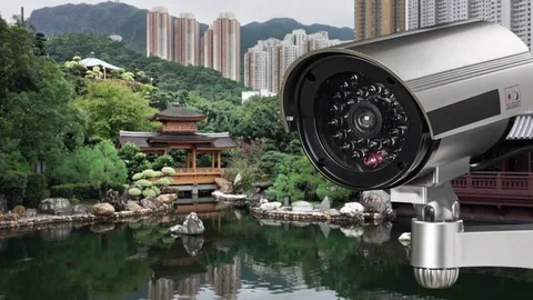 CCTV security camera front of a national park in city of China. Video stock 83231635