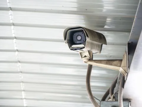 CCTV security camera installed in airport and subway for security guard monit Stock Photos