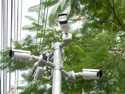 CCTV security camera installed in village for security guard monitoring and s Stock Photos