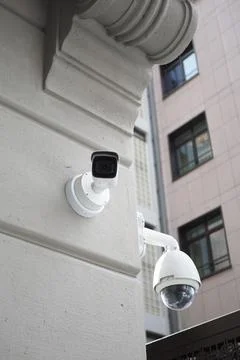 CCTV security camera operating outdoor Stock Photos