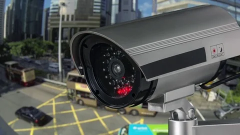 CCTV Security Camera or surveillance operating on traffic road and urban scene. 스톡 동영상 82959628