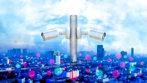 CCTV security camera or surveillance system with cityscape Stock Photos