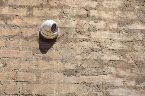 CCTV Security Camera. Security camera mounted on the outdoors brick wall Foto stock