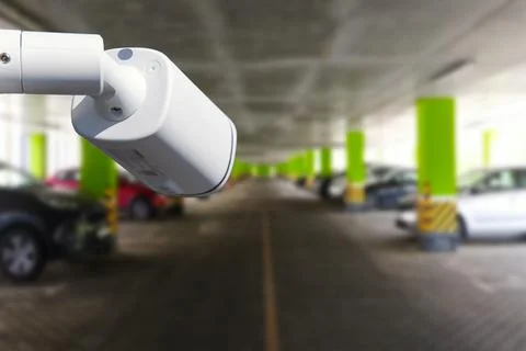 CCTV Security Camera setup on Parking lot. Copy space. Stock Photos