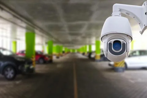 CCTV Security Camera setup on Parking lot. Copy space. Stock Photos