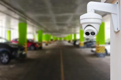 CCTV Security Camera setup on Parking lot. Copy space. Stock Photos