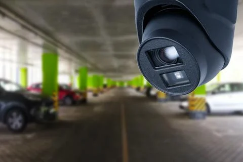 CCTV Security Camera setup on Parking lot. Copy space. Stock Photos