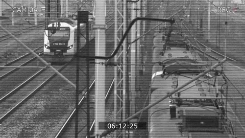 CCTV Security Camera view of Electric Passenger Train on Multiple Tracks Railway Stock Footage 151232058