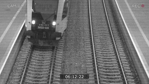 CCTV Security Camera view of Passenger Suburban Train Arriving at Train Station Video stock 151231970