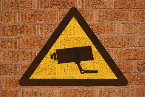 Cctv sign on brick wall 스톡 일러스트