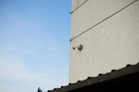 CCTV Surveillance Camera Installed on White Concrete Wall Stock Photos