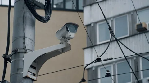 Cctv surveillance camera recording outside modern city downtown building. Stock Footage 166650276